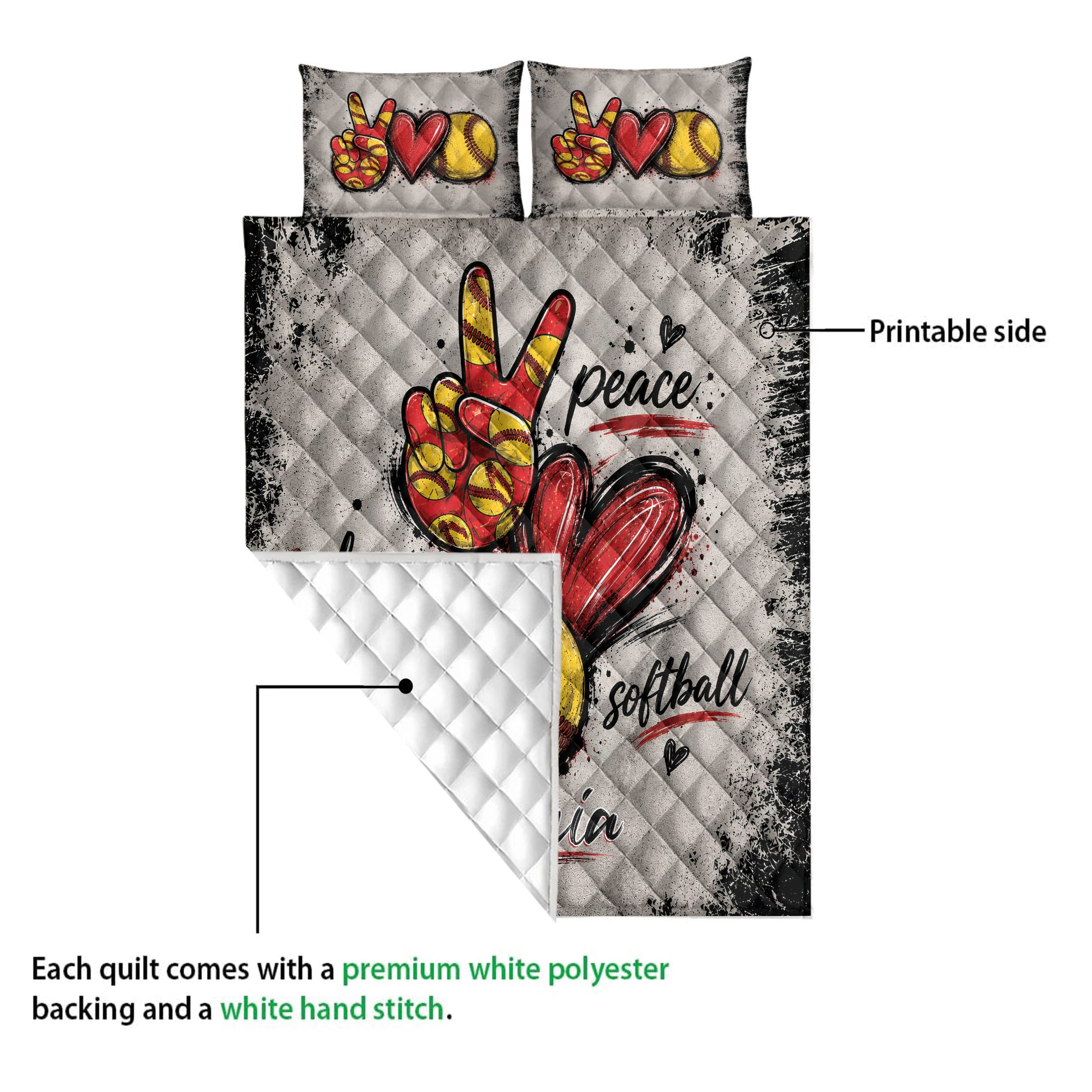 Softball quilt detail showing the printed front, white quilted backing, and bold red, yellow, black artwork