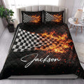 Flaming checkered flag racing quilt blanket styled in a modern bedroom