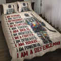 Hockey quilt bedding set displayed on a bed with colorful hockey player artwork and motivational sports typography