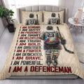 Hockey quilt bedding styled in a bright bedroom with hockey player artwork and bold motivational lettering