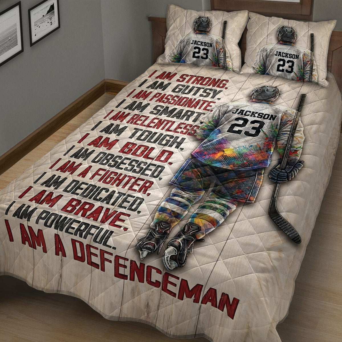 Hockey quilt blanket displayed across a bedroom with colorful player artwork, sticks, and sports-inspired typography