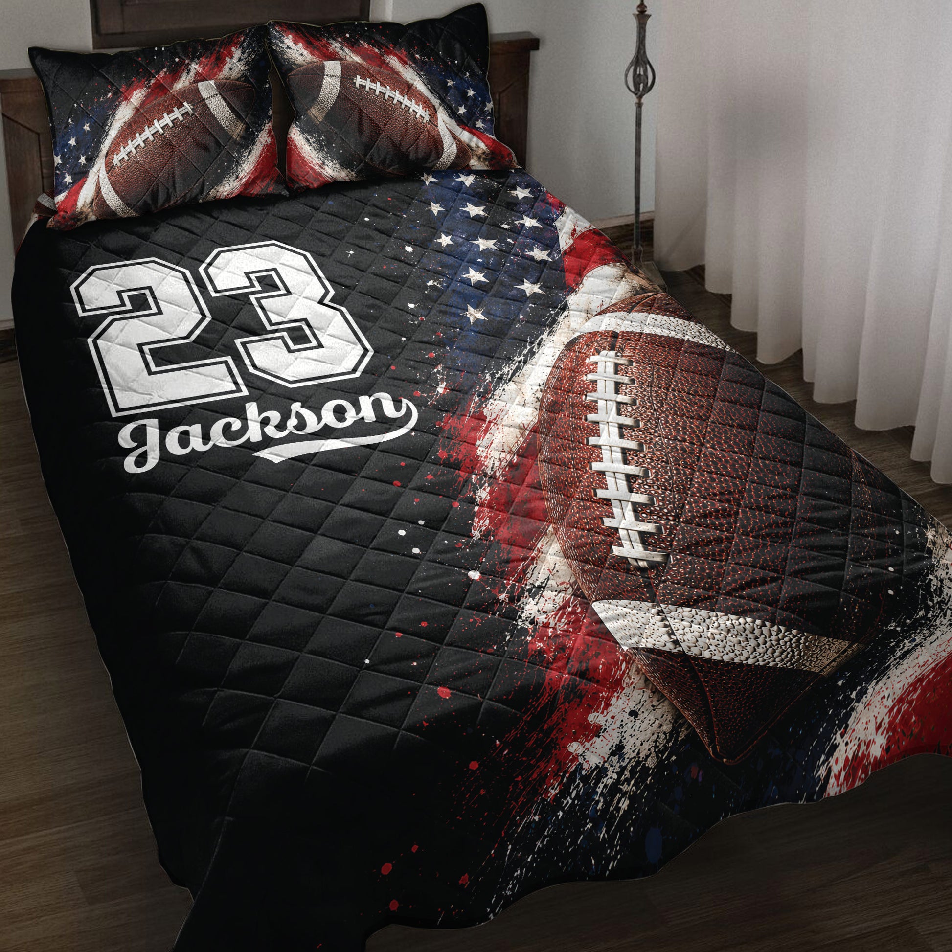Football quilt blanket on a bed with bold red, white, and blue artwork and a customizable sports jersey design