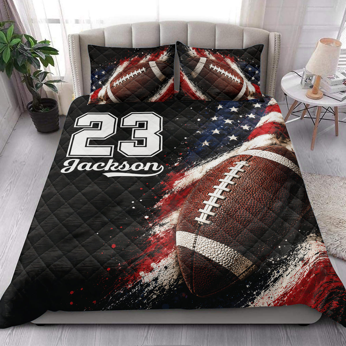Football quilt blanket styled on a bedroom bed with dramatic red, white, blue, and black sports artwork