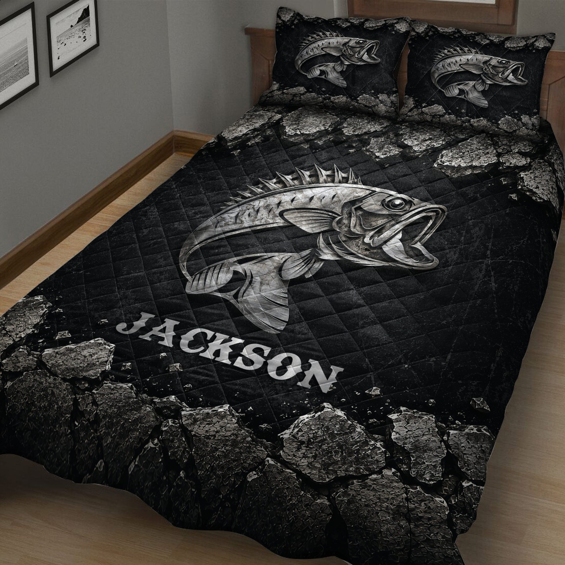 Close bedroom view of a black bass fishing quilt blanket with silver fish and stone artwork