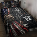 Soccer quilt blanket on a bed with patriotic stars, cross artwork, soccer ball, and athletic player design