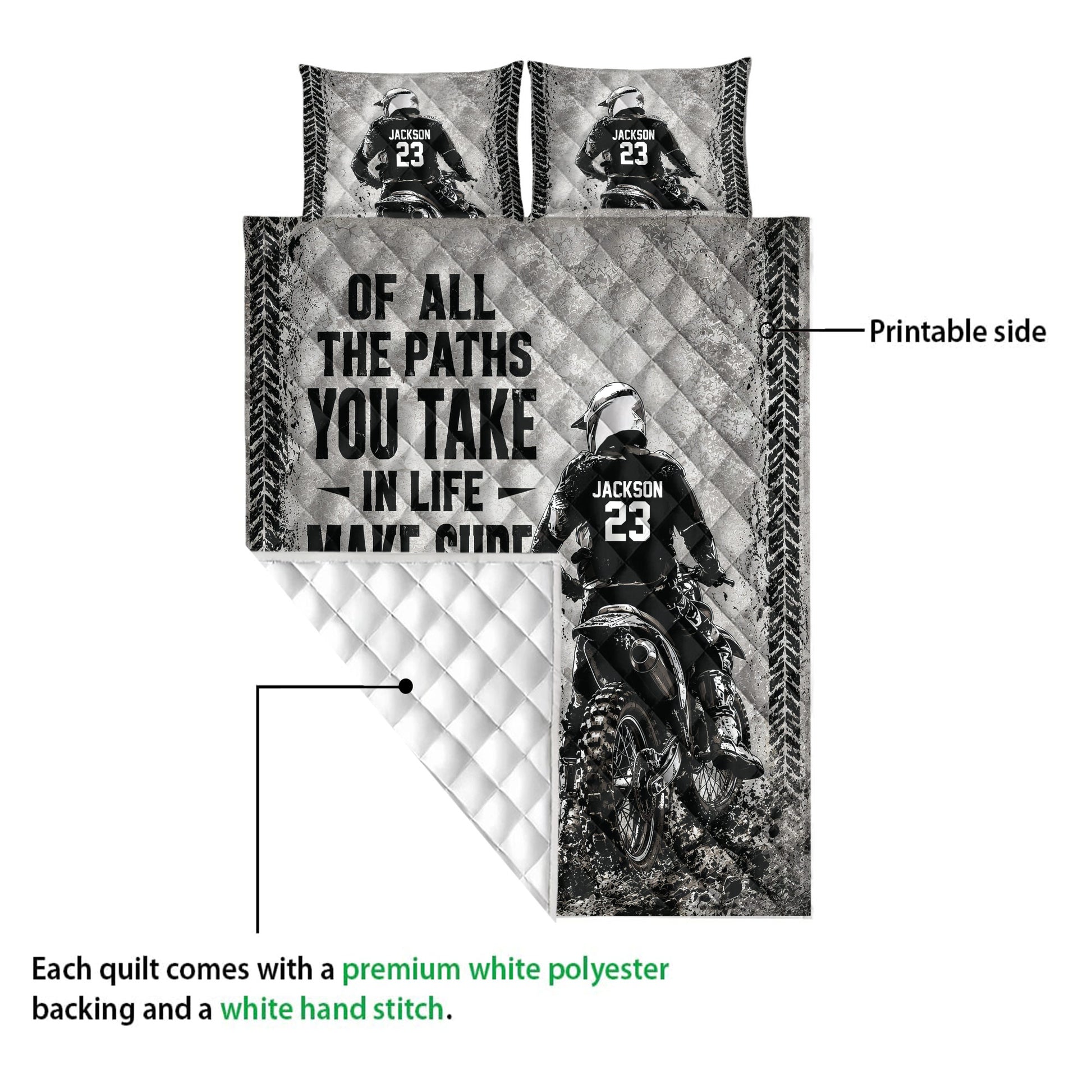 Motocross quilt showing the printed rider artwork and white quilted backing in a detailed product view