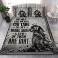 Motocross quilt bedding styled in a bright bedroom with dirt bike rider artwork and bold black typography