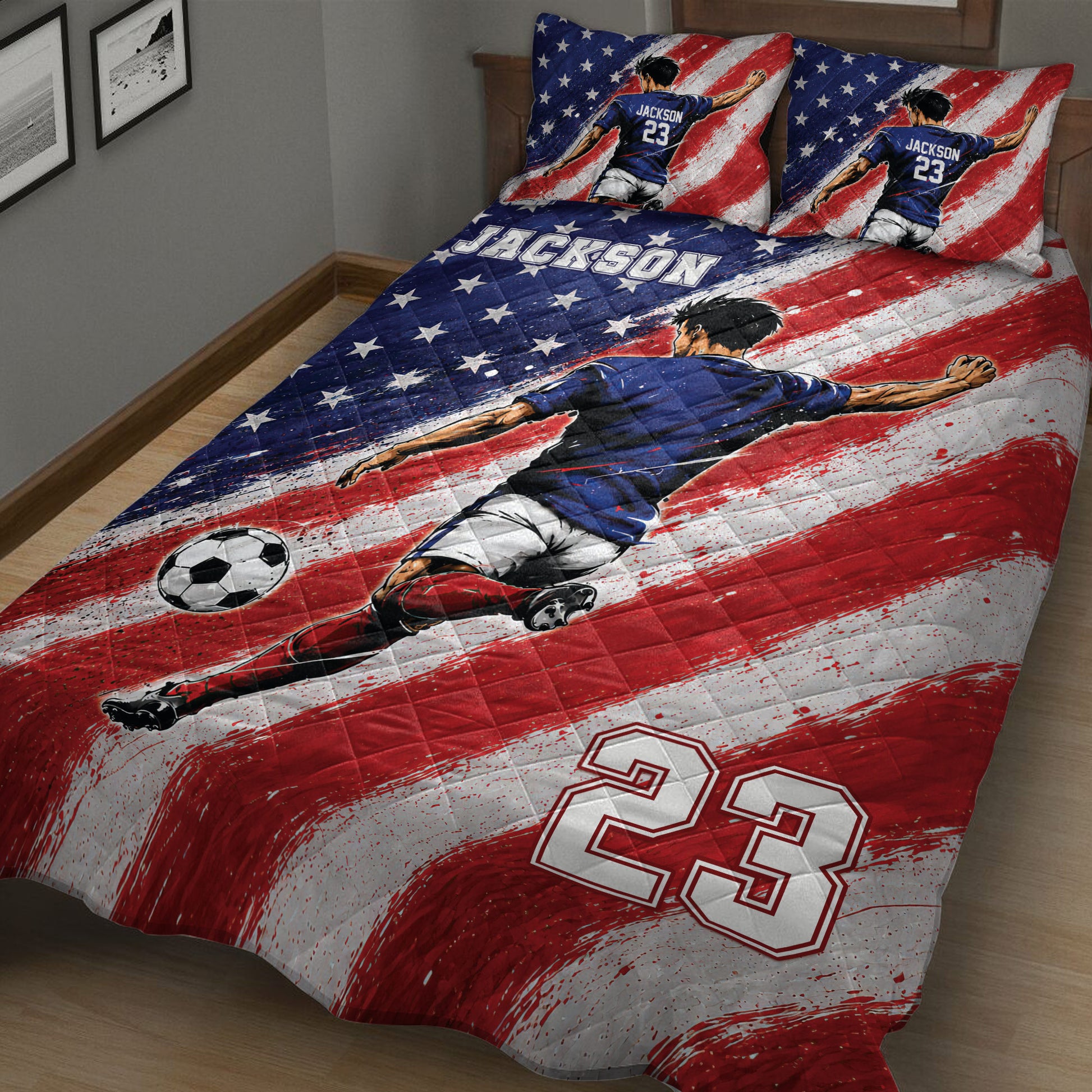 Close view of soccer quilt blanket featuring a running player, soccer ball, and patriotic colors