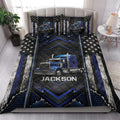 Trucker quilt blanket styled in a bedroom with bold blue semi-truck and industrial graphic artwork