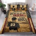 Baseball quilt blanket styled on a bed with vintage player artwork and patriotic star borders
