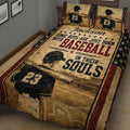Close view of baseball quilt bedding with batter artwork, baseball field imagery, and star accents