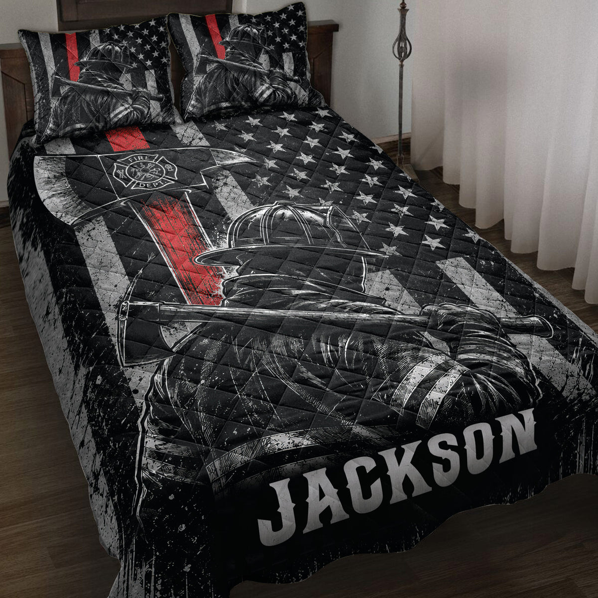 Firefighter quilt blanket displayed on a bed with patriotic flag artwork, helmets, stars, and bold red accents