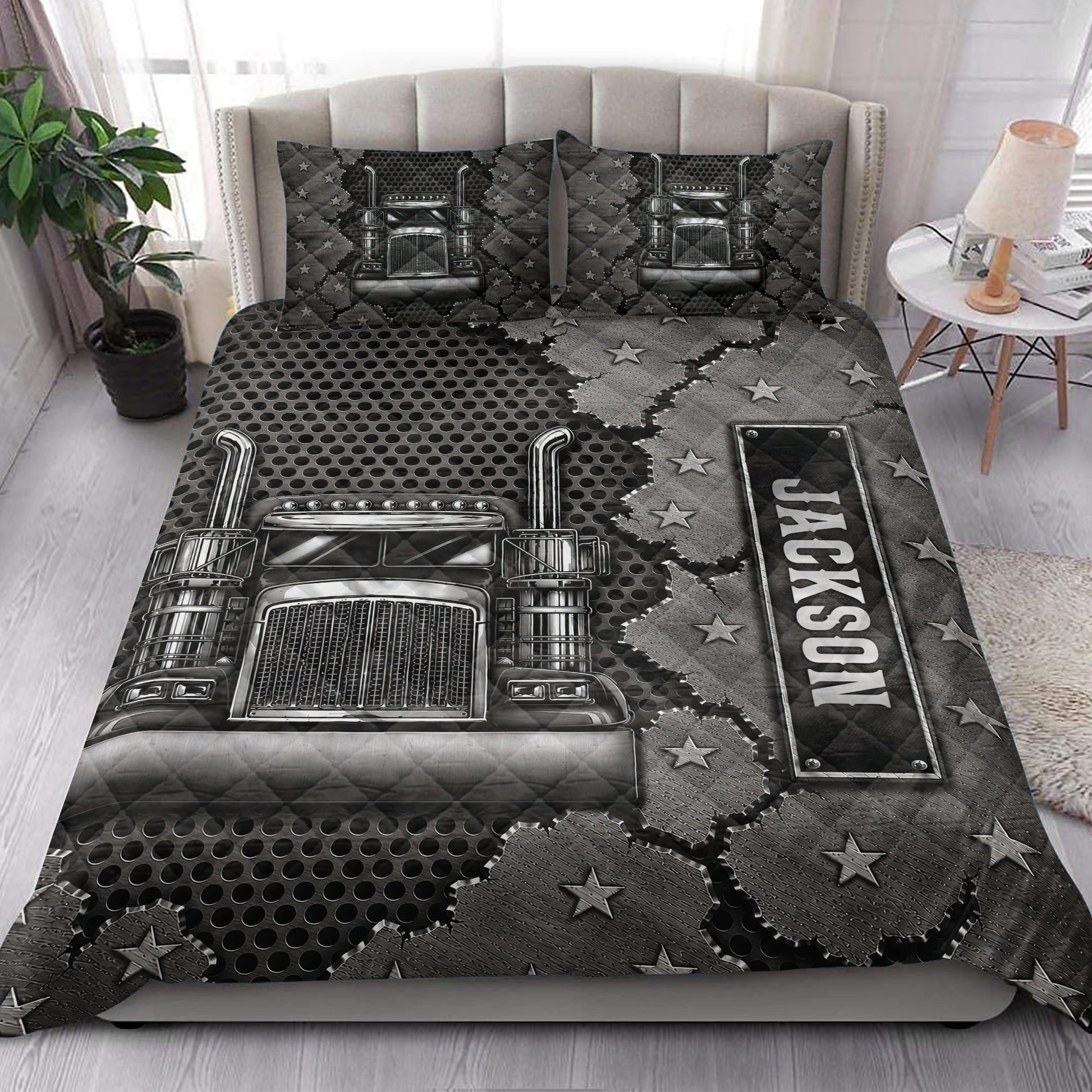 Trucker quilt blanket styled on a bedroom bed with bold semi truck and star artwork