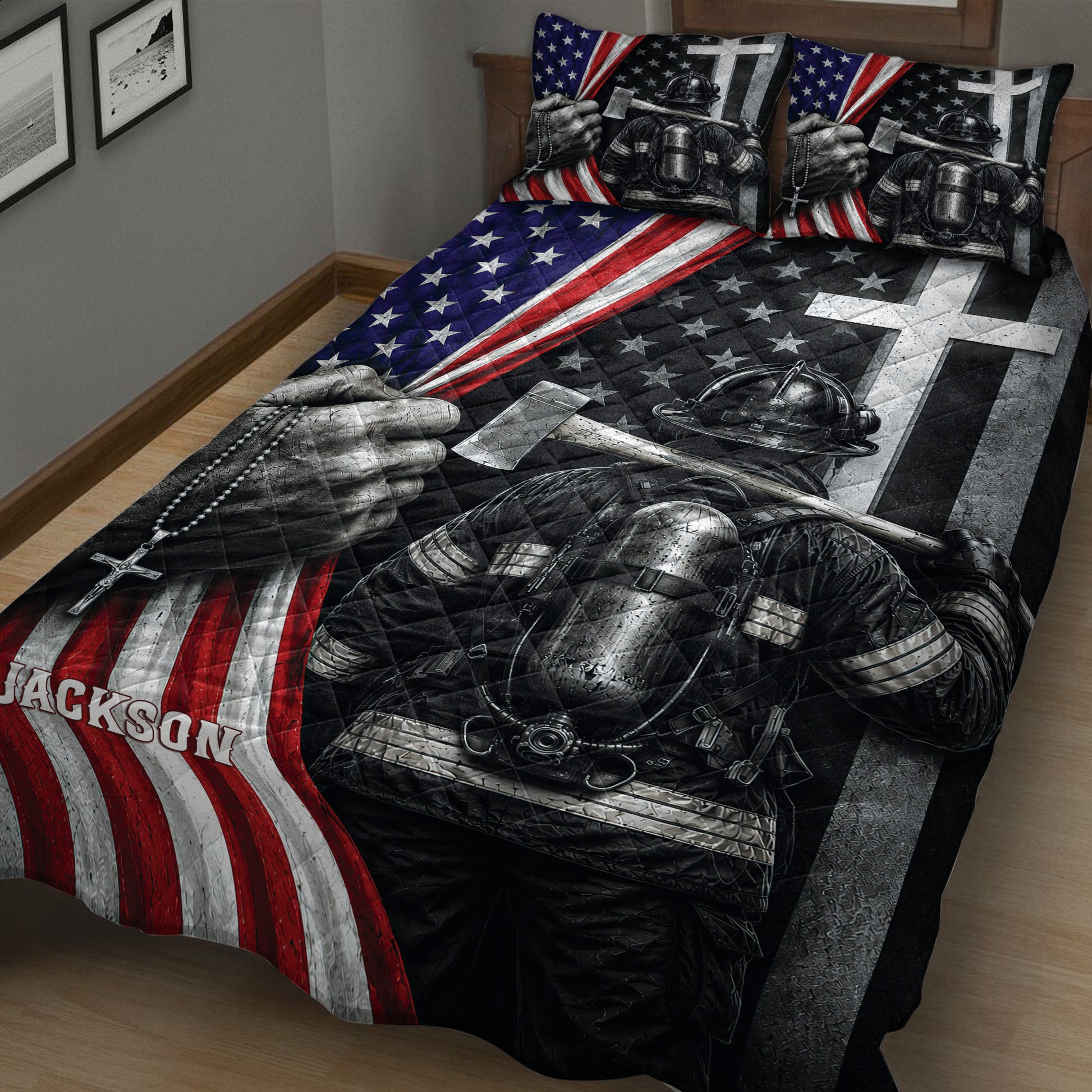 Close bedroom view of firefighter quilt bedding with helmet, protective gear, axe, and patriotic flag design