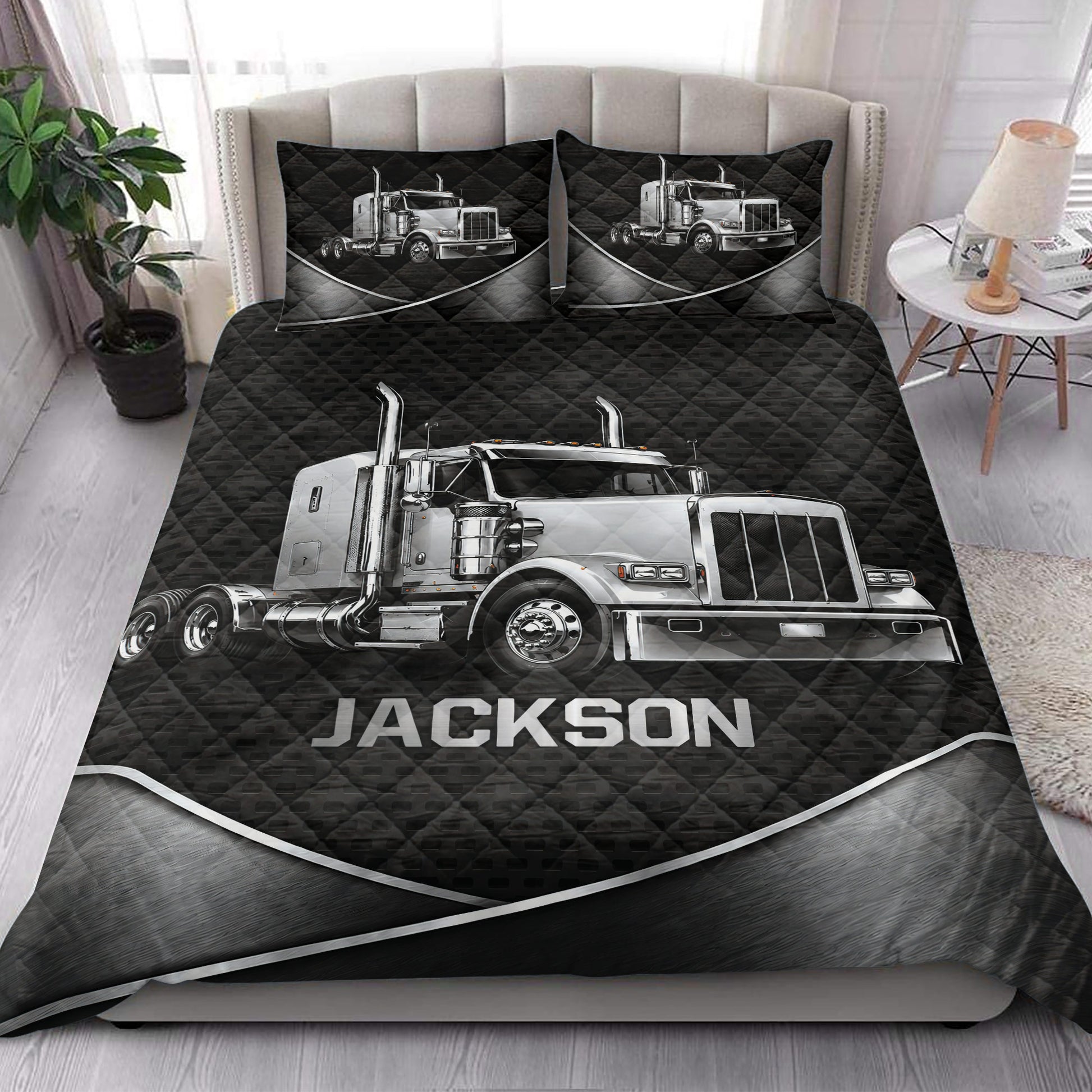 Trucker quilt bedding styled in a modern bedroom with large silver big-rig artwork