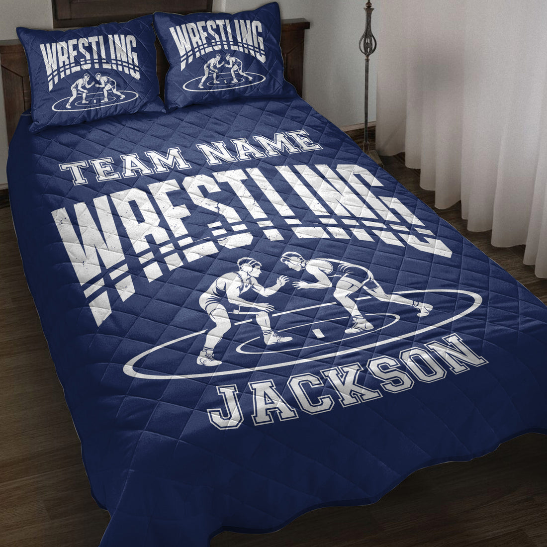 Navy wrestling quilt bedding set displayed on a bed with wrestling artwork and matching pillow designs