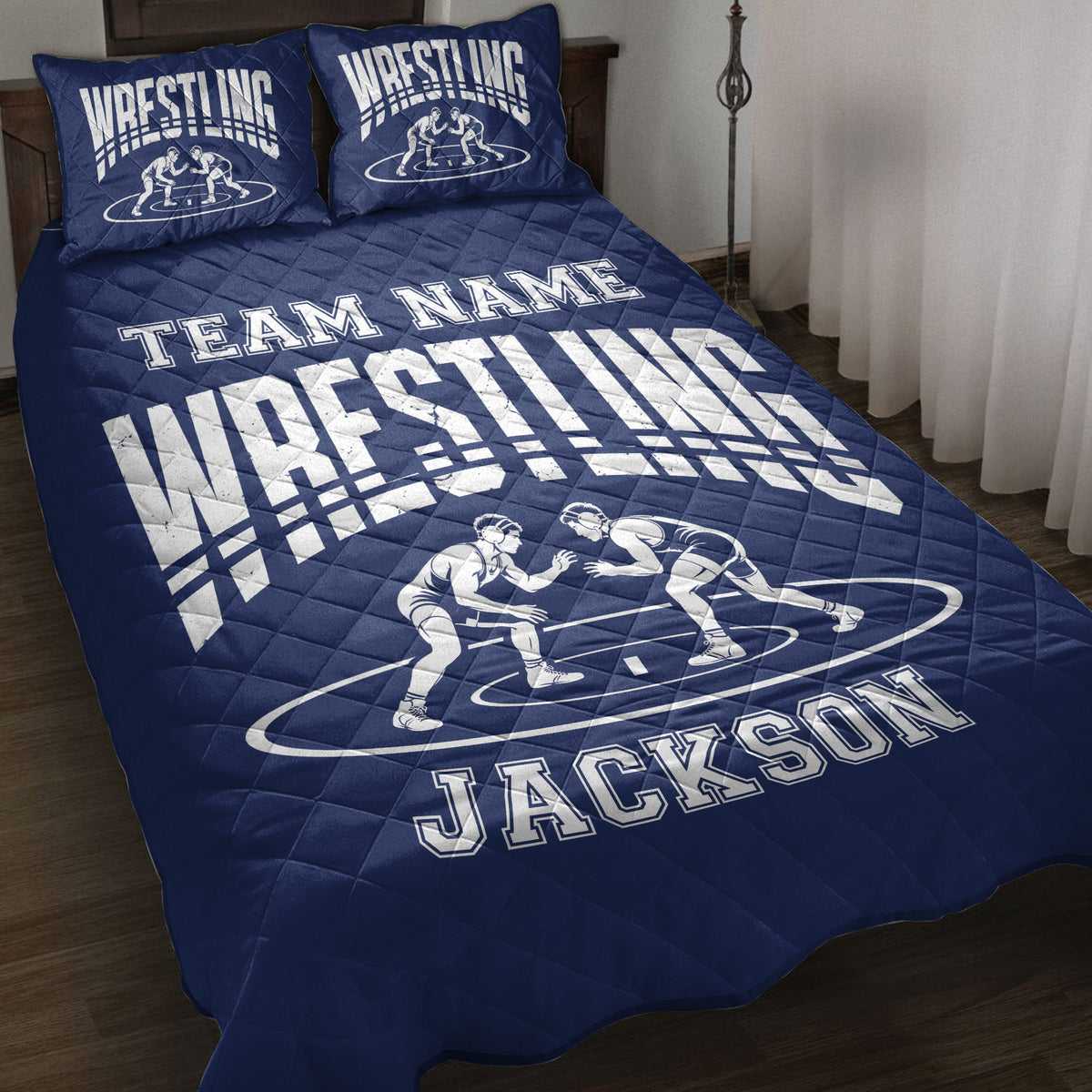 Navy wrestling quilt bedding set displayed on a bed with wrestling artwork and matching pillow designs