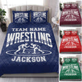Navy wrestling quilt bedding set styled in a bright bedroom with coordinated color examples