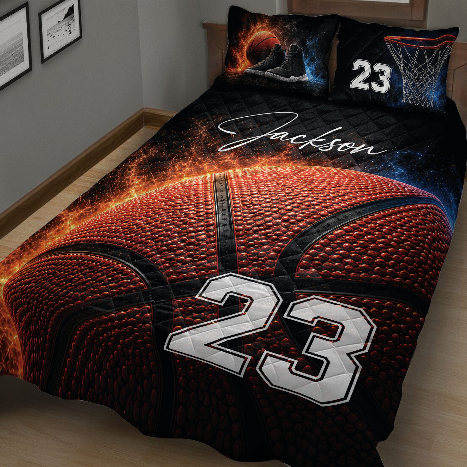 Close view of basketball quilt blanket with textured basketball artwork, hoop graphics, and bold athletic styling