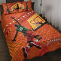 Orange basketball quilt bedding set displayed on a bed with player and hoop artwork