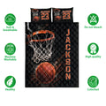 Basketball quilt bedding set shown with bold black and orange hoop and basketball artwork