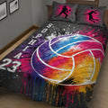 Close-up volleyball quilt blanket with vibrant paint-splash design and large multicolor volleyball