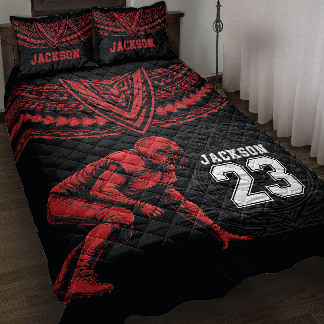 Black and red football quilt blanket displayed on a bed with a helmeted player and bold jersey-style artwork