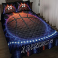 Basketball quilt blanket displayed on a bed with dramatic orange and blue sports artwork