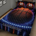 Close bedroom view of a basketball quilt blanket with fiery orange and deep blue design