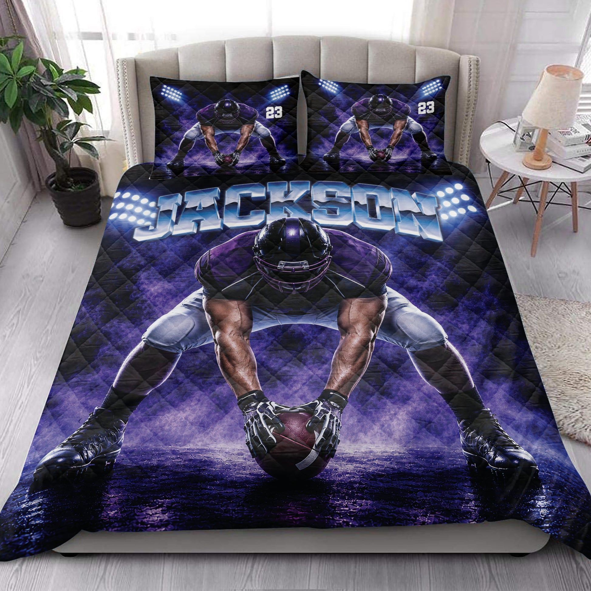 American football quilt bedding styled on a bedroom with purple player artwork and stadium light graphics
