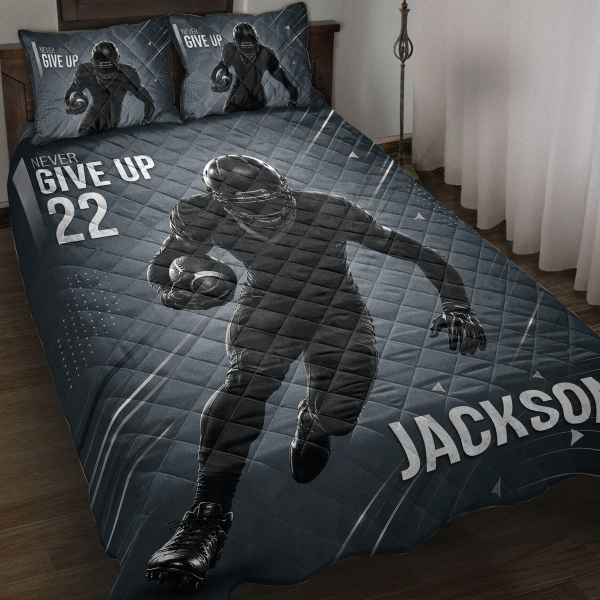 Football quilt blanket displayed on a bed with dark blue sports artwork and helmeted player design