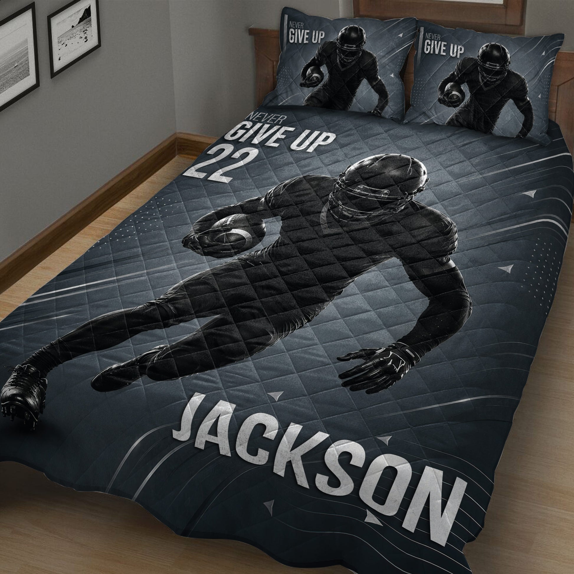 Close bedroom view of a football quilt blanket featuring a running player and bold sports graphics