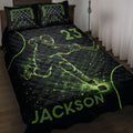 Black hockey quilt blanket displayed on a bed with neon green ice hockey player and rink artwork
