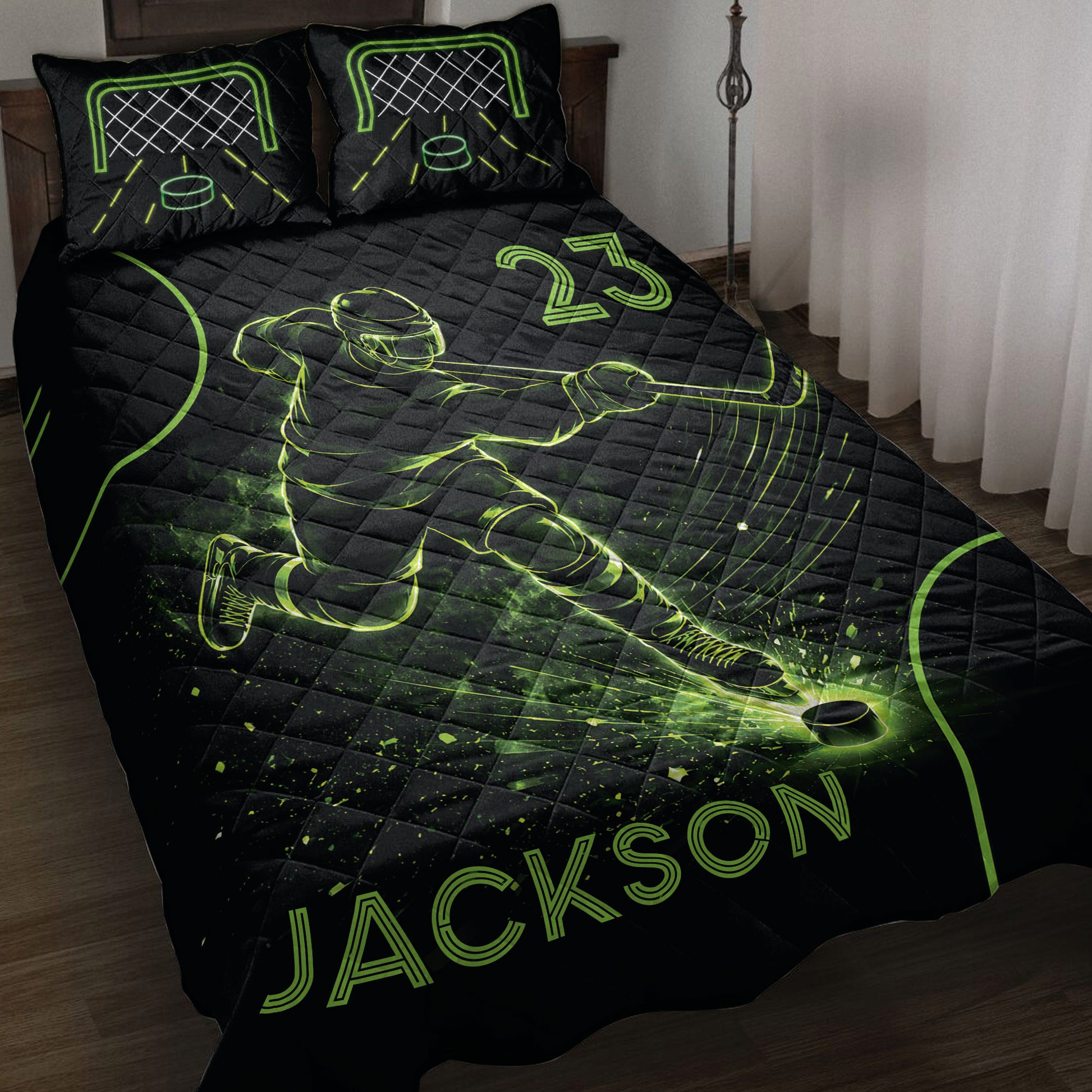 Black hockey quilt blanket displayed on a bed with neon green ice hockey player and rink artwork