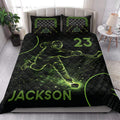Hockey quilt bedding styled on a bedroom bed with black and neon green ice hockey artwork