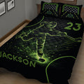 Angled view of a black hockey quilt blanket featuring a dynamic ice hockey player and glowing puck