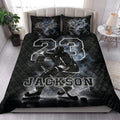 Hockey quilt blanket styled on a bedroom bed with ice hockey player artwork and bold monochrome graphics