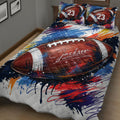 Close-up American football quilt blanket featuring a large textured football and energetic red, blue and orange artwork