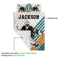 Hockey goalie quilt showing the printed front artwork and white quilted reverse side