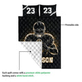 Football quilt blanket detail showing the printed side, white quilted backing, and player artwork