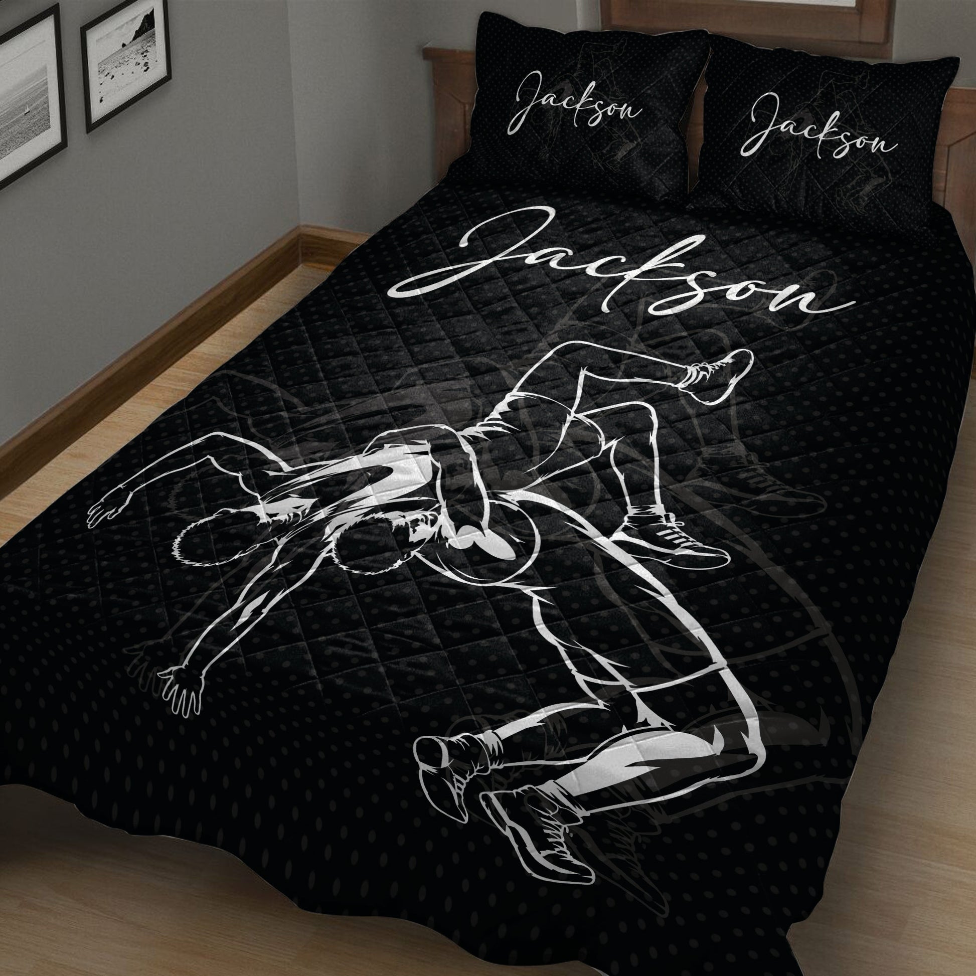 Angled view of black wrestling quilt blanket featuring two wrestlers in action