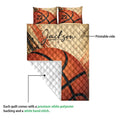 Basketball quilt blanket detail showing the printed side and diamond quilted backing