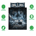 Hockey quilt bedding set shown flat with icy blue rink artwork, hockey stick, puck, and feature icons