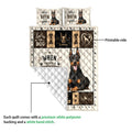 Doberman quilt blanket showing the printed front and white quilted reverse side