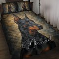 Doberman quilt blanket styled on a bed with black and bronze artwork and matching dog portrait bedding