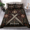 Knights Templar quilt blanket styled in a bright bedroom with crossed swords and medieval heraldic details