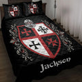 Black Knights Templar quilt blanket on a bed with red and white heraldic shield artwork