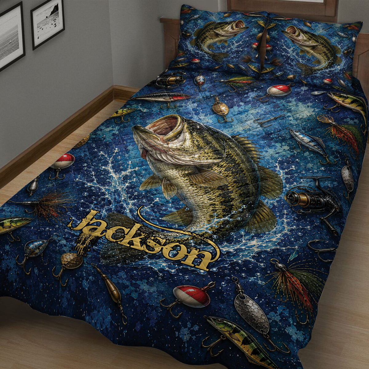 Close bedroom view of a bass fishing quilt blanket with lures, reels, hooks, and aquatic artwork