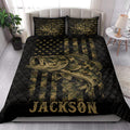 Bass fishing quilt blanket styled in a bedroom with large camouflage bass artwork and matching decorative pillows