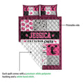 Cheerleading quilt blanket detail showing the printed front, white backing, and pink striped border